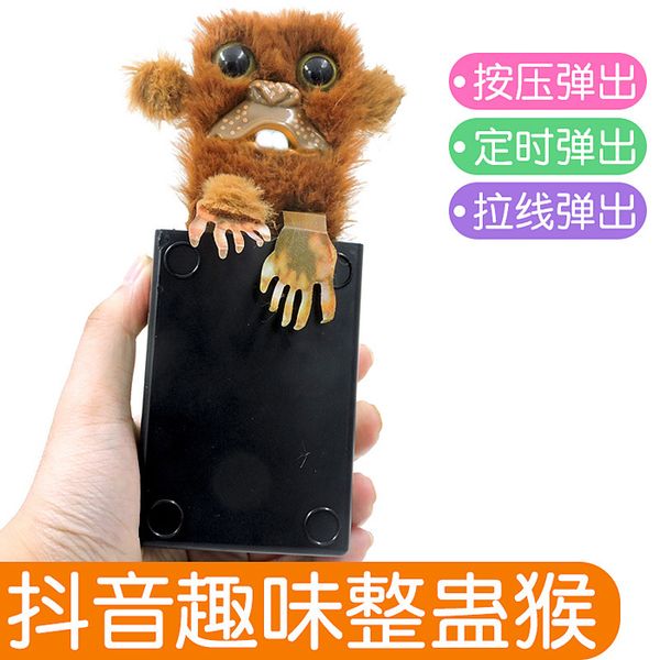 

creative trick toys prank buckteeth spit tongue monkey pull wire timing spoof gifts