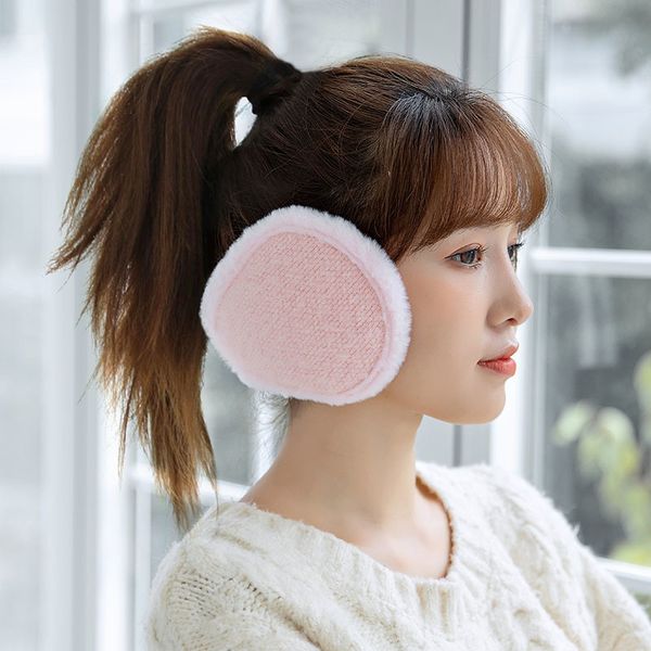 

in warm earmuffs for men and women winter