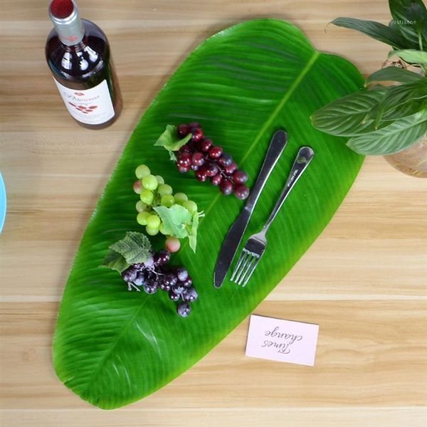 

4pcs hawaii heat-resistant placemats banana leaf nonslip waterproof dining table mats for home kitchen accessories1