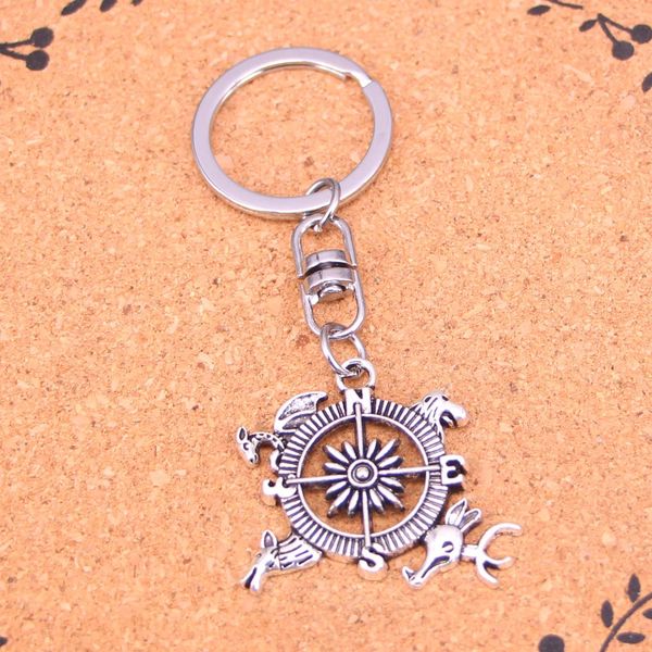 Keychain de moda 28*34mm Compass Animal Lion Dragonfly Deer Pingents