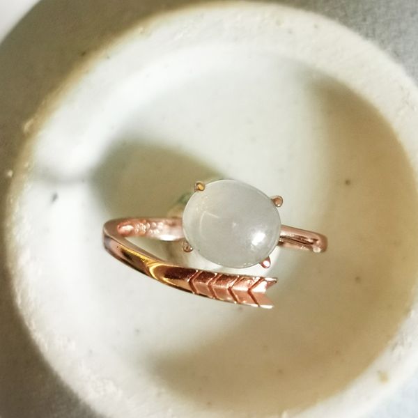 

jade egg ring shaped like an arrow, Golden;silver
