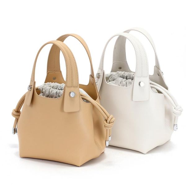 

новая натуральная кожа сумка женщин ниша design solid color drawstring bag wild плеча сумка женская портативный bucket