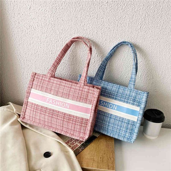 

bag2022 factory wholesale new oblique cross bag female student large capacity simple summer net red checkered hand armpit bag tote trendy co