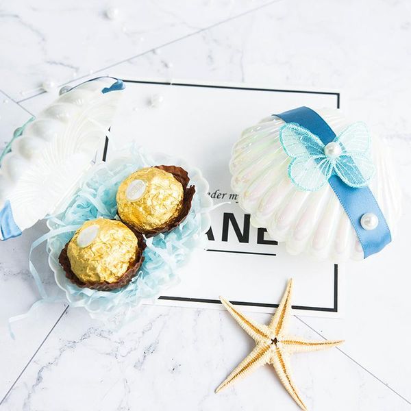 

gift wrap shellswedding candy box packaging bag plastic boitedragees mariagetra ktatiekinderen paper cajas regalo cellofaan1