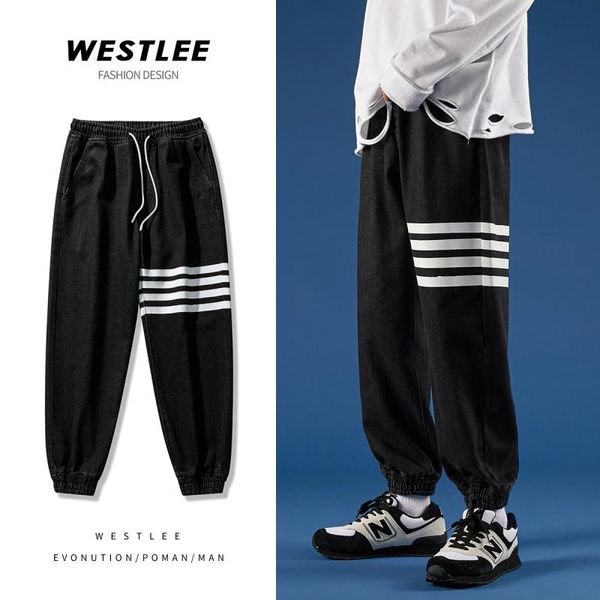 

men's jeans 2021 couple autumn and winter print bouquet feet loose denim trousers men black blue fashion