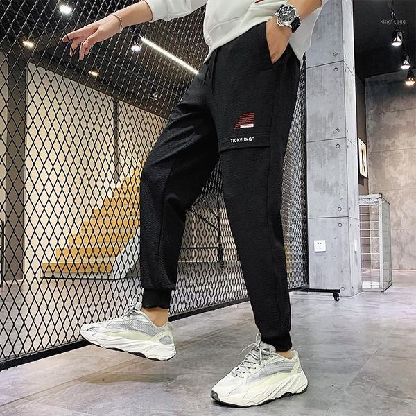 

pants men new loose pocket track pants men black casual loose printing wild fashion clothing drawstring1