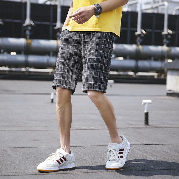 

new men's plaid loose size fashionable casual shorts, White;black
