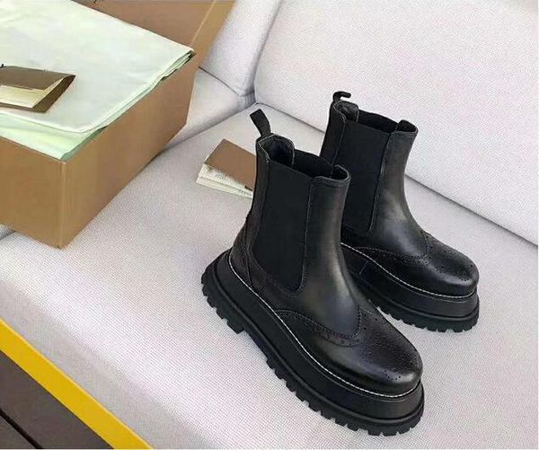 

woman london england guideport platform ankle boots black calf leather slip-on trimmed fabric decorated perforated shoes