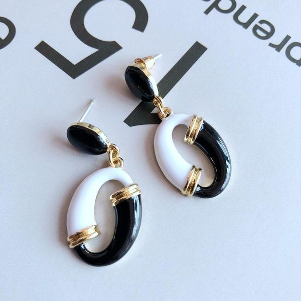

stud black and white enamel fashion elegant exquisite earring, Golden;silver