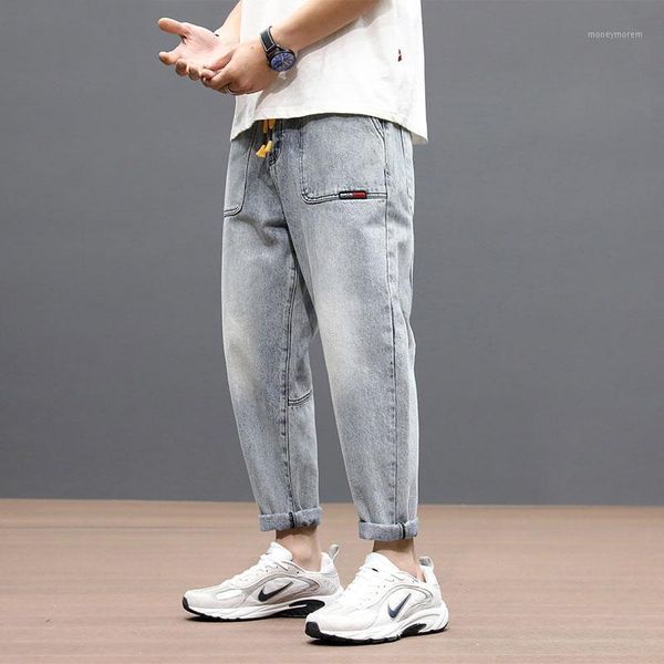 

korean fashion men jeans retro light blue loose fit denim harem pants elastic waist streetwear hip hop jeans men taper trousers1