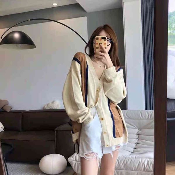 

2022 factory wholesale new high version autumn fashion color contrast college style hollow jacquard diamond check women's cardigan, White