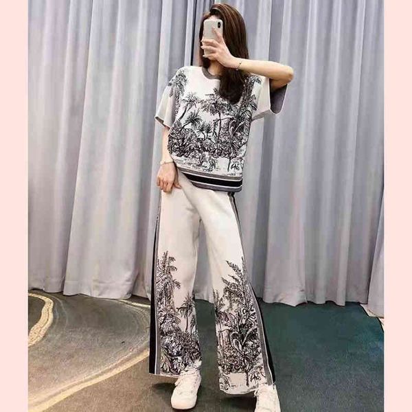 

2022 factory wholesale new short sleeved casual suit women's loose fashion trendy wide leg pants two-piece suit in trendy summer, Gray