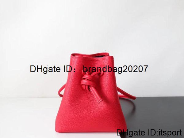 

rope charm2019 bucket pulling litchi grain head layer cowhide genuine leather woman package concise single shoulder satchel small