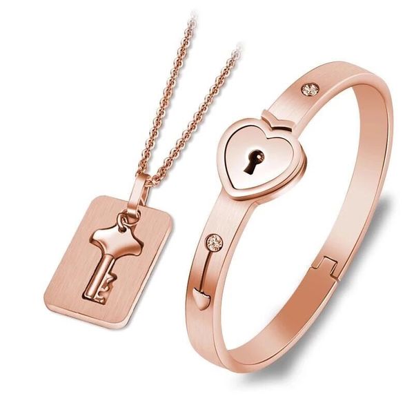 

a pair of interlocking bracelets and keys designed to commemorate the anniversary of long-distance love gifts, Silver