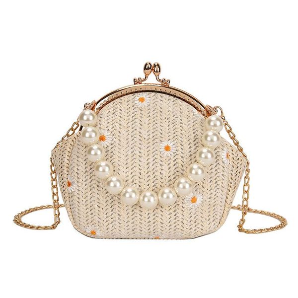 

2020 new leisure girl pearl hand-held bag grass woven embroidered small daisy beach women's bag