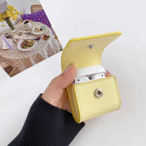 

fashion desinger airpods case backpack style 4 colors airpods package with inverted triangle pattern with keychain-3