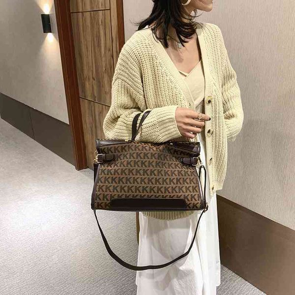 

2022 latest handbag factory store canvas women's shoulder versatile trend