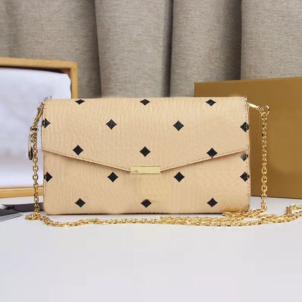 Bolsas de ombro femininas bolsas femininas clássicas Bolsa Envelope Bolsas de grife Letras metálicas Couro genuíno Lantejoulas Hasp Bolso com aba única tamanho MM amarelo