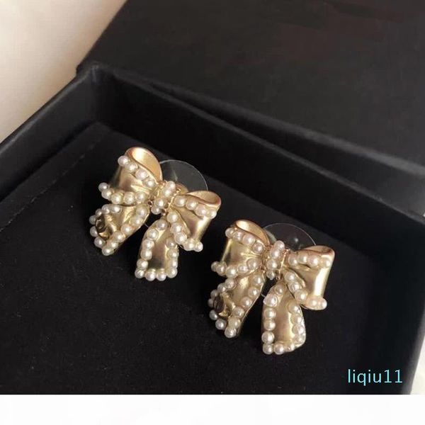 

c1885 europe and the united states fashion beaded earring girl sweet bowknot fashion ear stud women's jewelry, Golden;silver