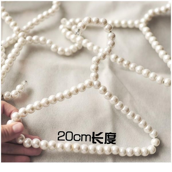 

5/10pcs white color fashion plastic pearl bow clothes clothing hanger for kids children pet bbymgw