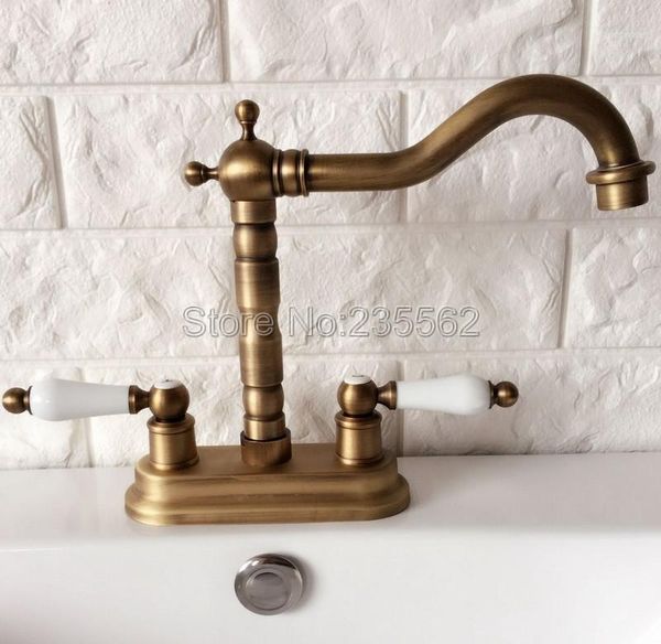 

bathroom sink faucets antique brass 2 hole deck mounted dual handle faucet swivel spout washbasin mixer vessel taps lan0651