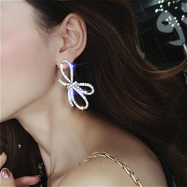 

2pcs/set women earrings temperament hollow bow knot crystal silver color earring set fashion dance party jewelery, Golden;silver
