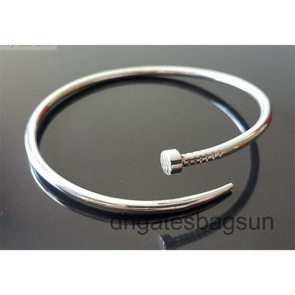 

exclusive design twisted nail bangle 14k white gold over rocker bracelet, Black
