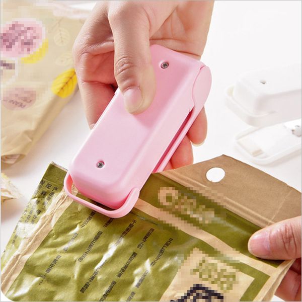 

portable household mini sealing machine travel food plastic bag hand pressure sealing machine pulse sealing portable heat sealer vt1952