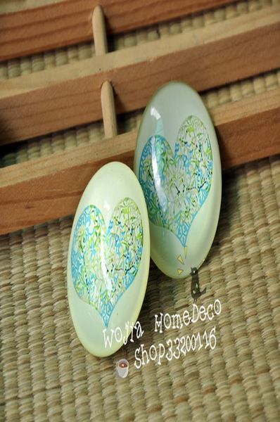 

бесплатная доставка мода бледно-зеленый спирально рана кальмар в форме хрустальный стеклянный стеклянный холодильник магнит украшения дома j