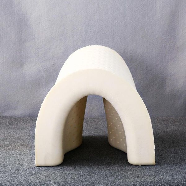 

natural latex pillow protects the cervical spine butterfly to form a human pillow butterfly-shaped cymbal on the bed