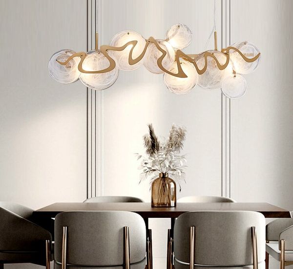 Nuova illuminazione moderna del lampadario d'oro per la sala da pranzo Lampade a sospensione rotonde in vetro spazzolato oro-bronzo di lusso creativo
