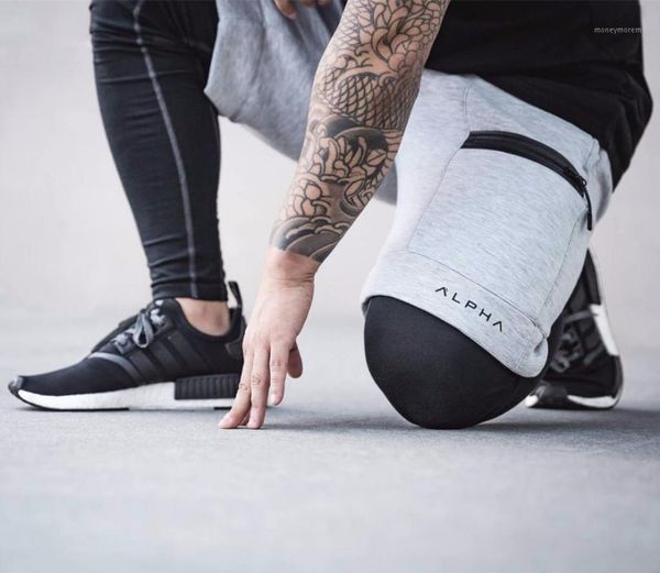 

new fashion men sporting beaching shorts trousers cotton bodybuilding sweatpants fitness short jogger casual gyms men shorts1, White;black