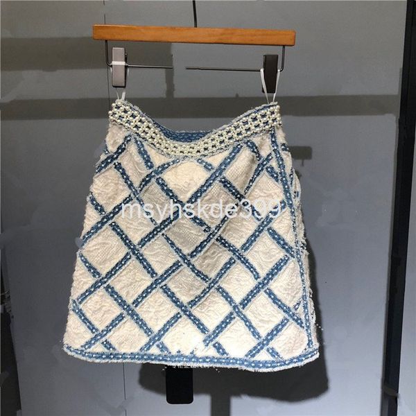 

two piece dress one after another, y have launched a niche trend. in spring and summer of 19, color matching denim pearl diamond check skirt, White