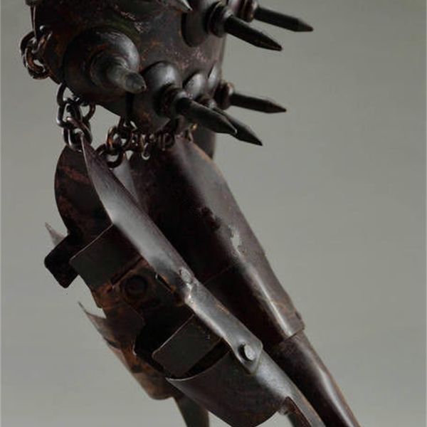 

old hammered ancient copper collectibles protective decorated gloves in war