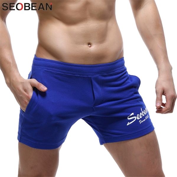 

men's gyms short trousers casual joggers sweatpants fitness men workout acitve shorts q1103, White;black