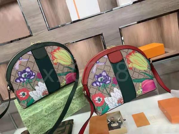 

designer designed the flower shell bag.inclined hanging bag. stylish and versatile.