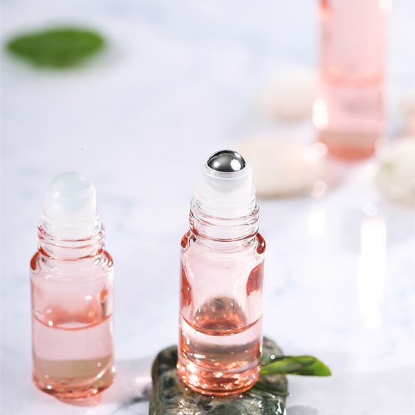 

12 / 10 ml pink gold roll in an empty thick glass bottle for perfume of stainless steel ball base oil