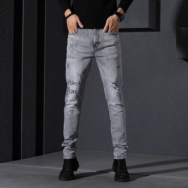 

2019 spring and autumn new men's perforated printed jeans fashion loose straight pants trend, Blue