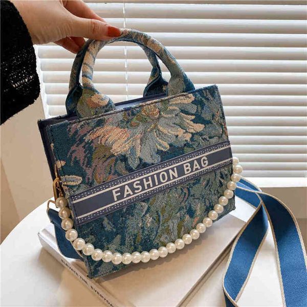 

80% off shop clearance large capacity bag women's new fashion version simple shoulder bag printed foreign style canvas
