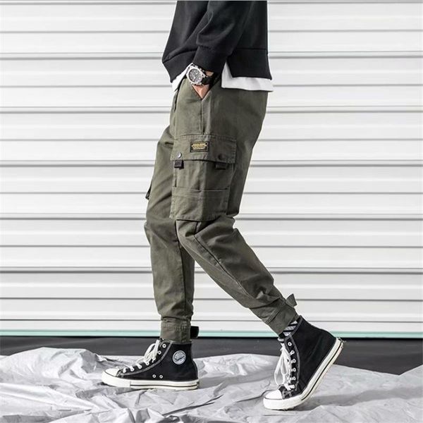 

2021 men's side pockets cargo harem pants fashion ribbons black hip hop casual male joggers trousers fashion streetwear pants