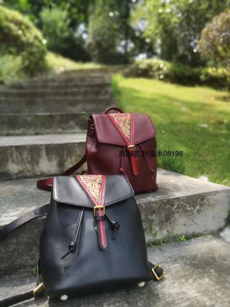 

xhty leather backpack female suede leather medium high-end original handmade carving postage