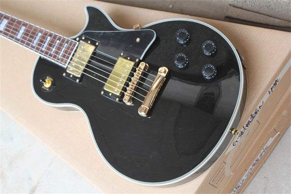 

black electric guitar, rosewood fingerboard, gold hardware, solid mahogany body electric guitar guitars guitarra