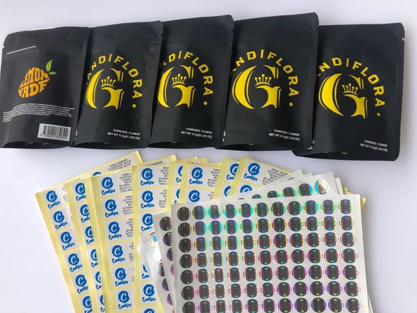 

cookies grandiflora black yellow bags medicated edibles local smell proof bags 3.5g mylar bags hologram stickers and flavors label qylip