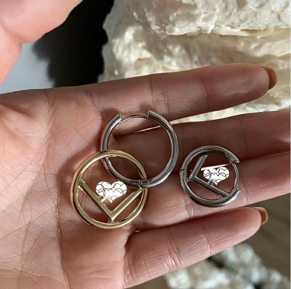 

2021 european and american new geometric golden fashion earrings letter hollow round earrings personality asymmetric earrings, Silver