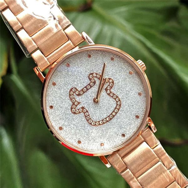 

new c family year of 2021 the ox commemorative quartz ultra thin women's watch with cowhide steel band watch, Slivery;brown