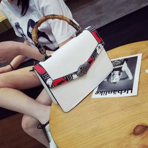 

pocket cell bags new famous 2017 phone popular design women handbags,high polyester quality bamboo handle snake head crossbody mukk 1slum