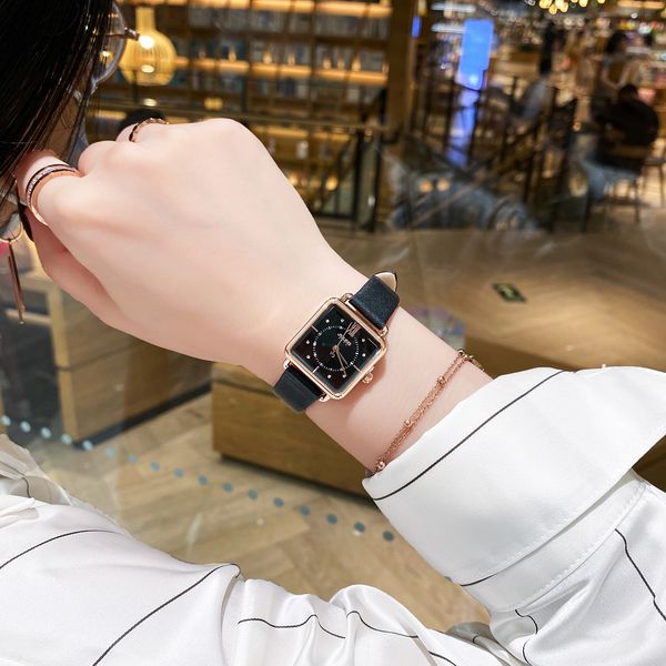 

julius is very simple and elegant with a small square watch for women