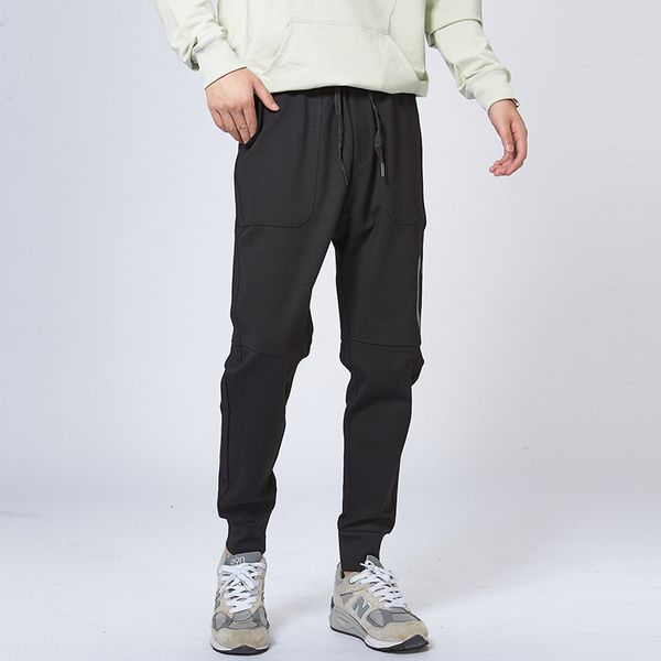 

spring new sports men's waist casual small foot loose pants elastic leggings, Black