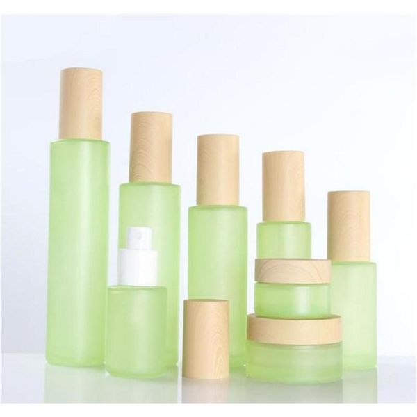 

20ml 30ml 40ml 60ml 80ml 100ml 120ml green frosted glass cream jar mist spray lotion pump bottle with wooden lids caps cosmetic