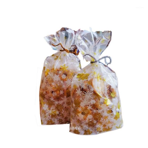 

gift wrap 50pcs golden and silver snowflakes plastic packaging bags, 6Ã10 inch clear treat bags for candy cookie snack1